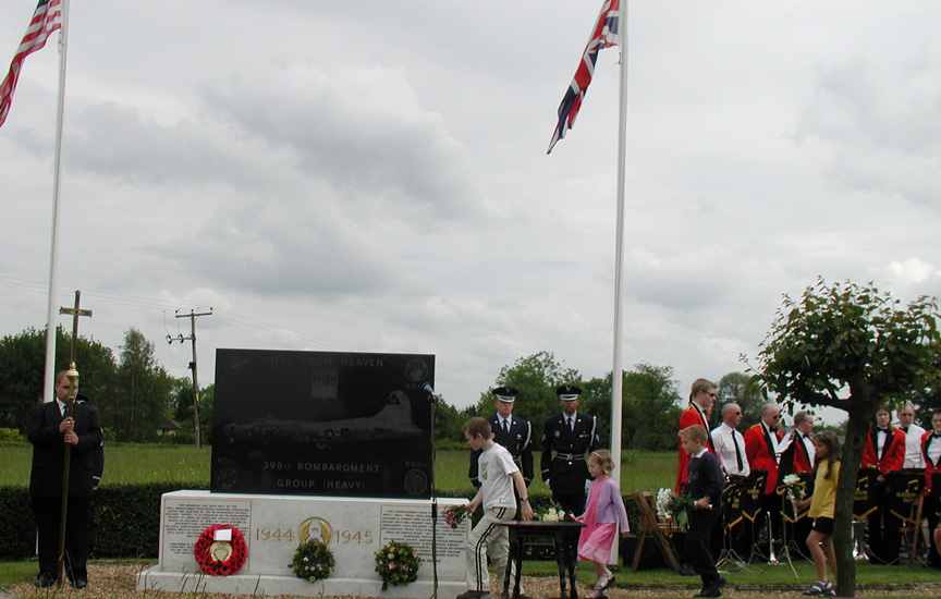 Children and Flowers at Nuthampstead Memorial - June 2002