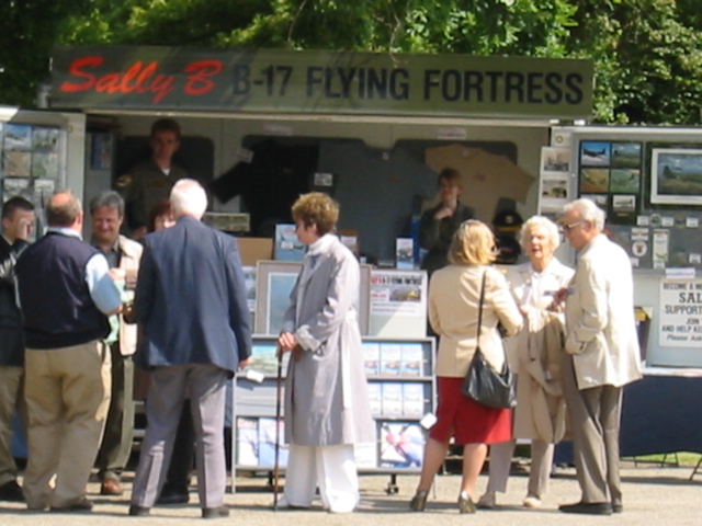 Sally B crew with memorabilia